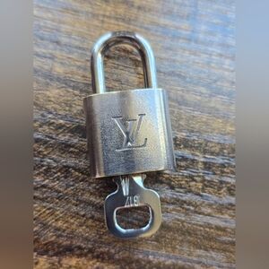 Louis Vuitton Metallic Silver Lock & Key #317
